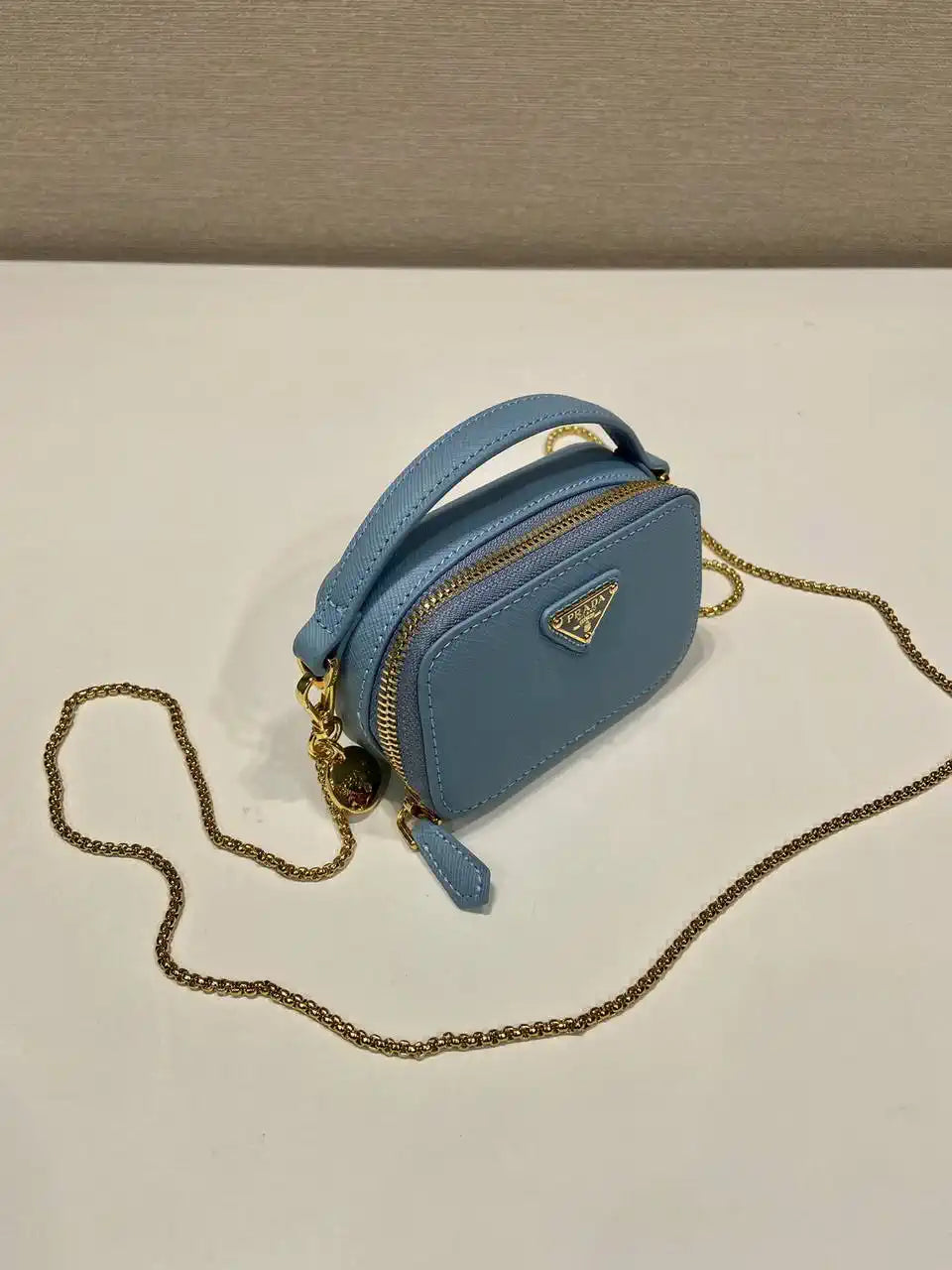 Prada 1NR025 Saffiano leather mini-pouch Blue