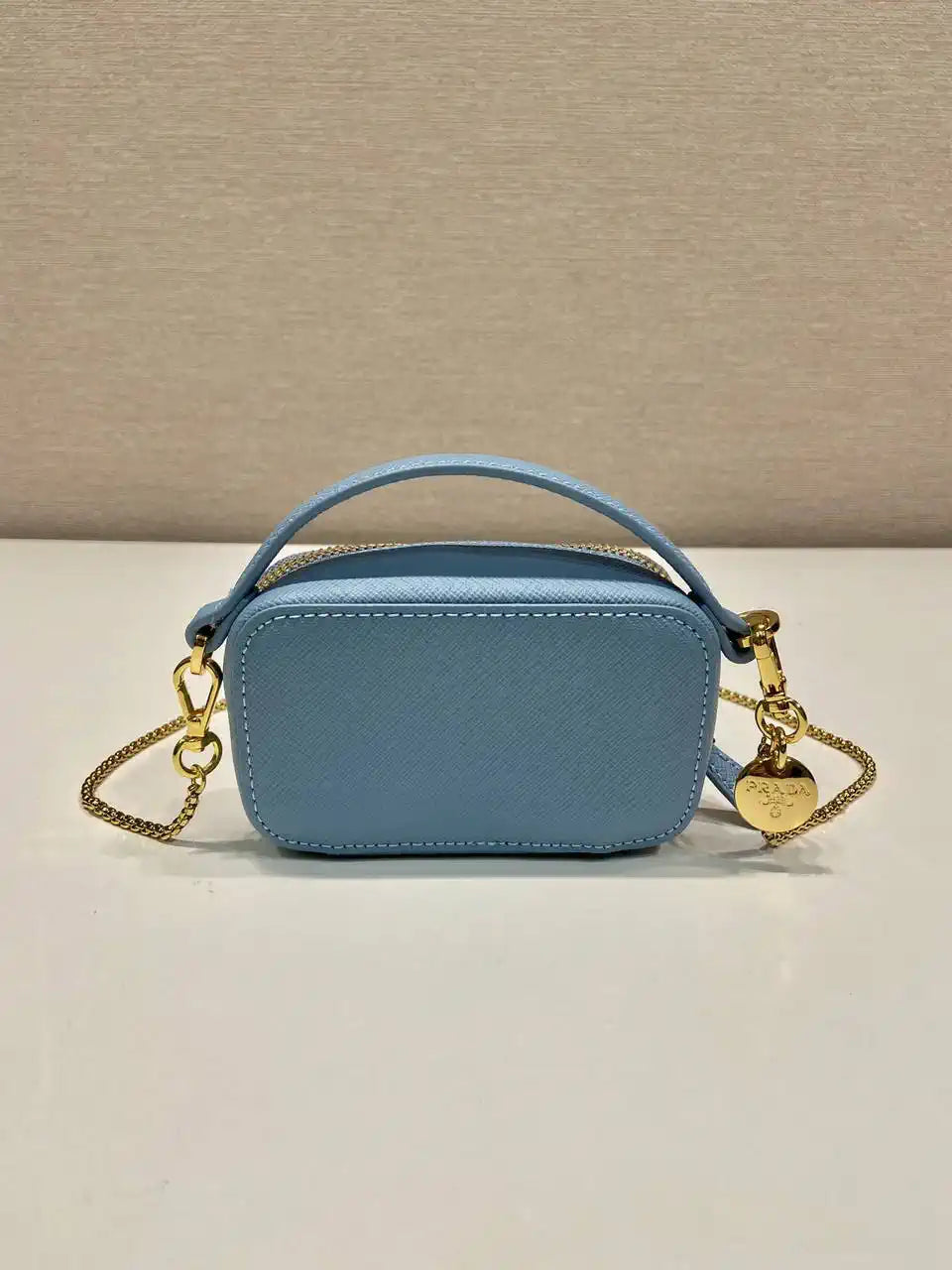 Prada 1NR025 Saffiano leather mini-pouch Blue