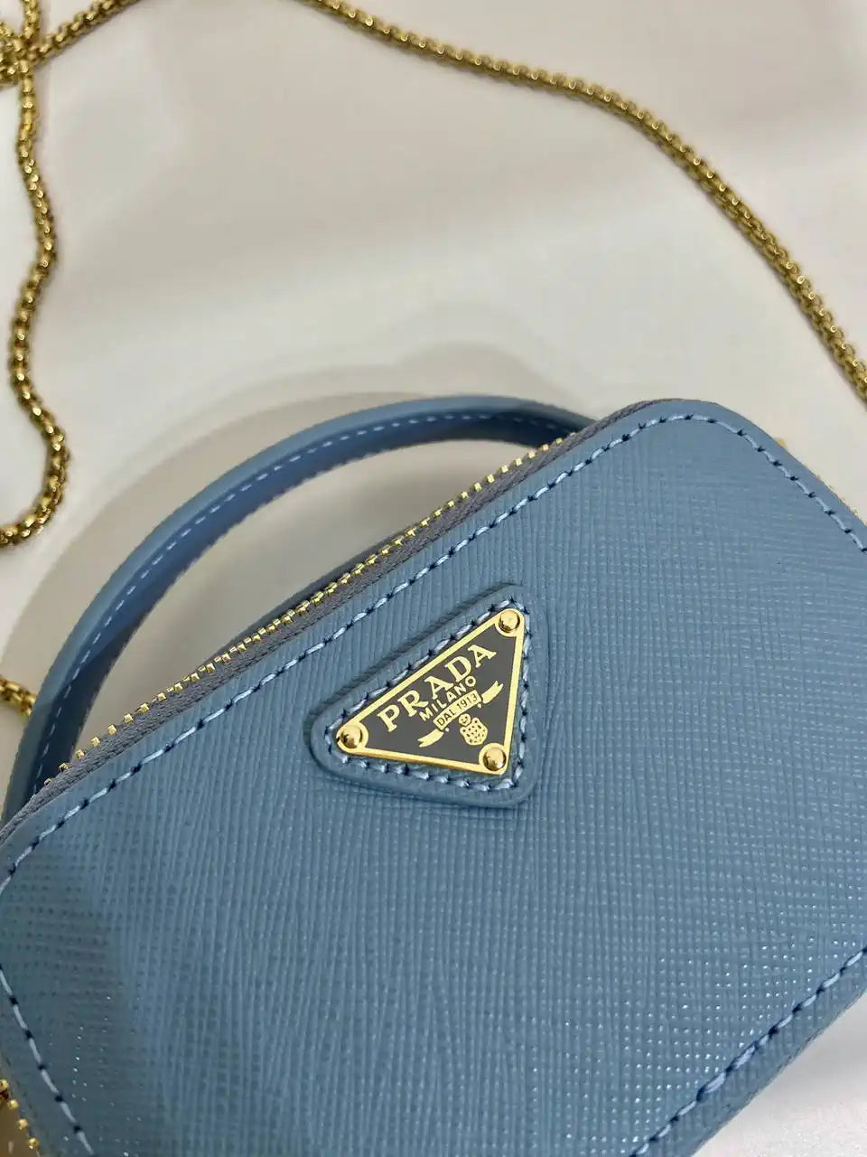 Prada 1NR025 Saffiano leather mini-pouch Blue