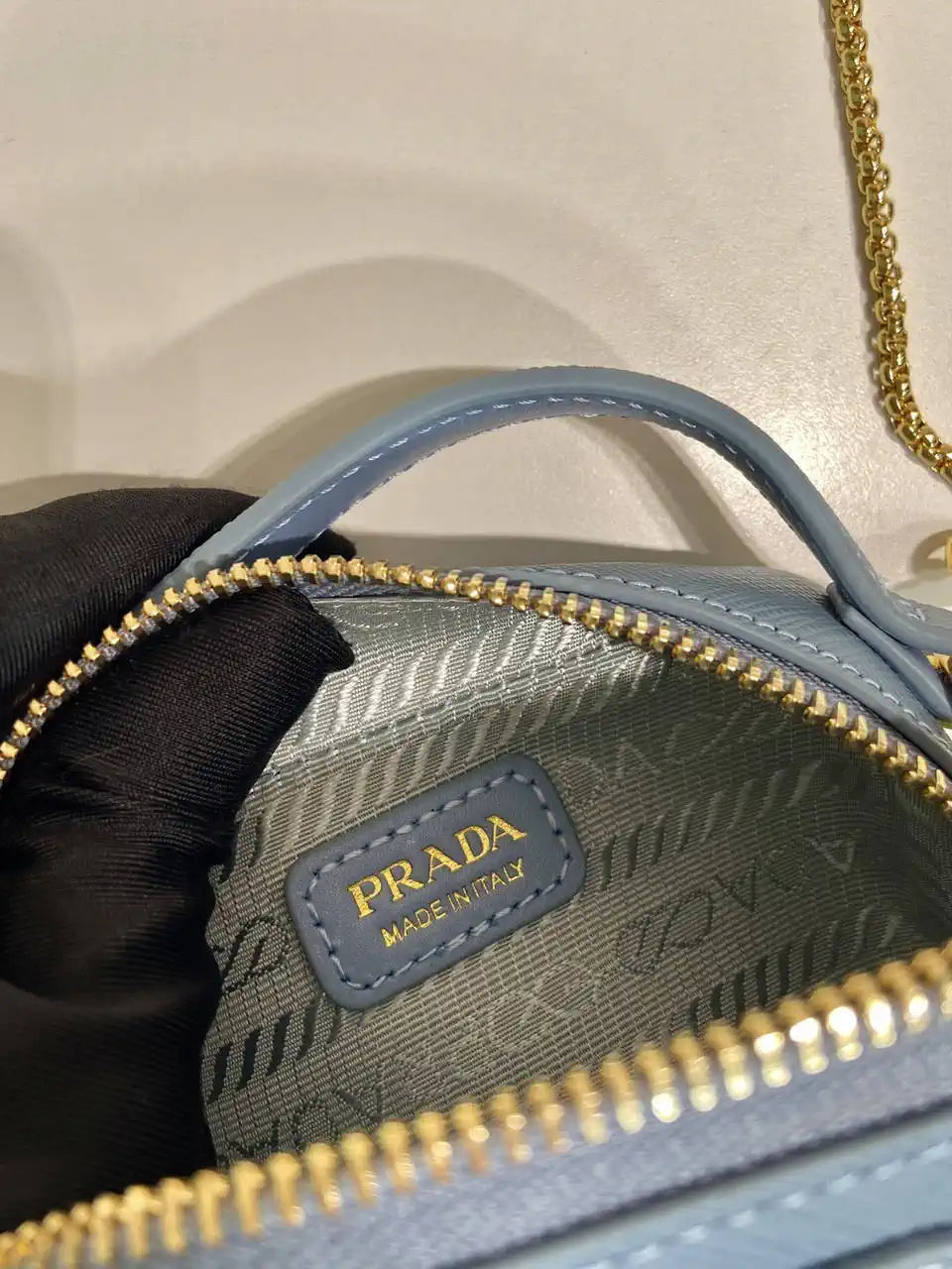 Prada 1NR025 Saffiano leather mini-pouch Blue