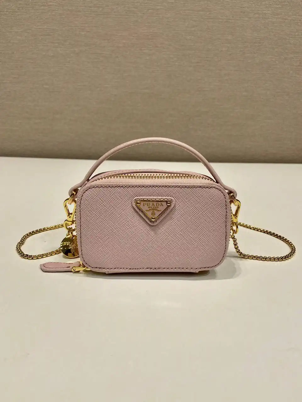 Prada 1NR025 Saffiano leather mini-pouch Pink
