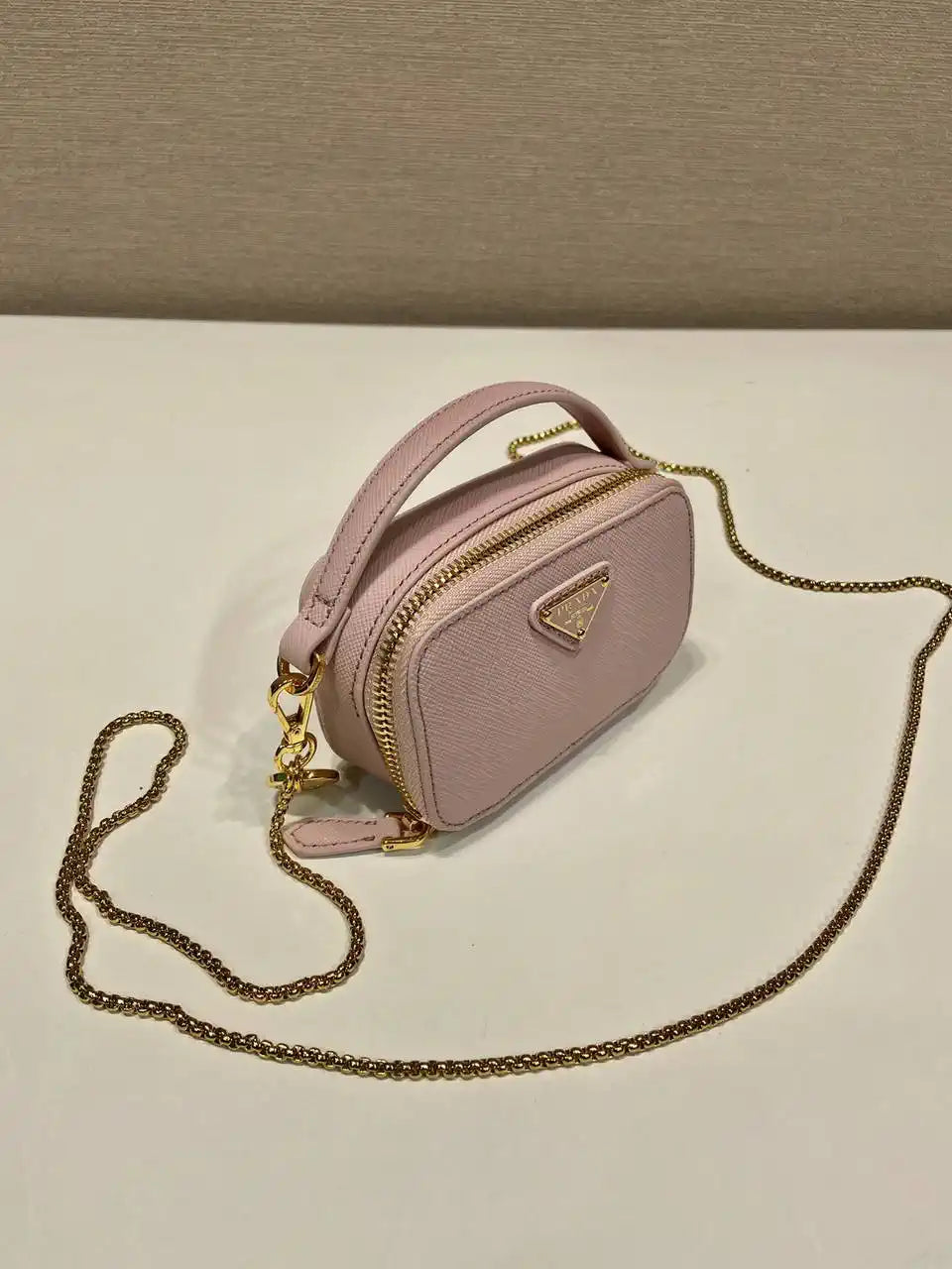 Prada 1NR025 Saffiano leather mini-pouch Pink