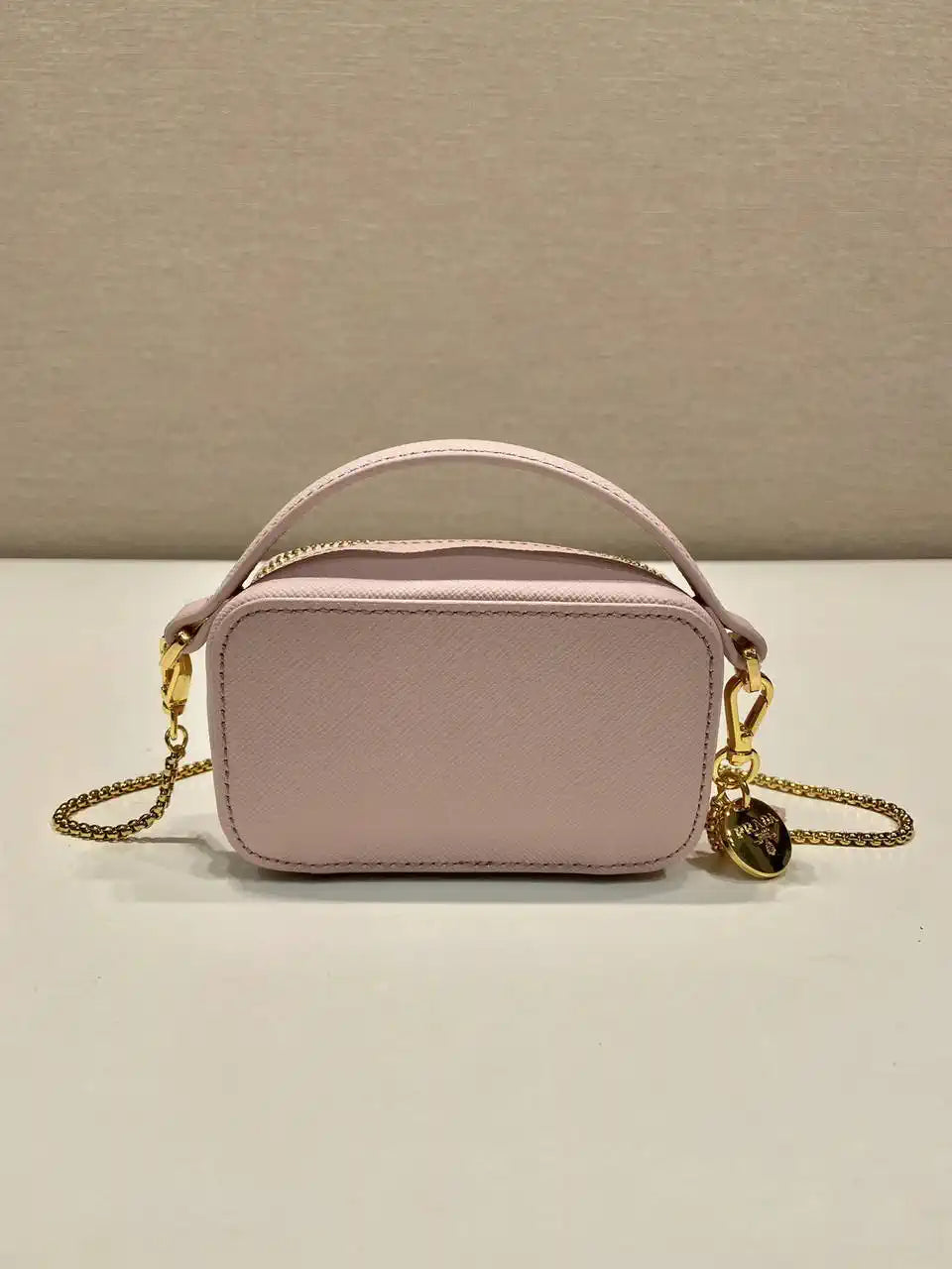 Prada 1NR025 Saffiano leather mini-pouch Pink