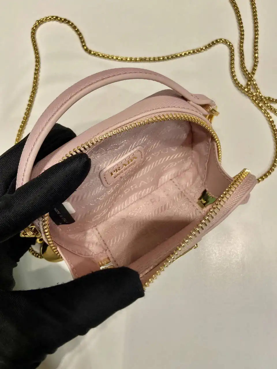 Prada 1NR025 Saffiano leather mini-pouch Pink