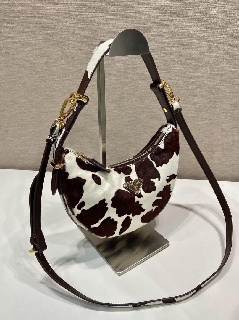 Prada  Arqué printed leather mini shoulder bag 1BC194 Honey White