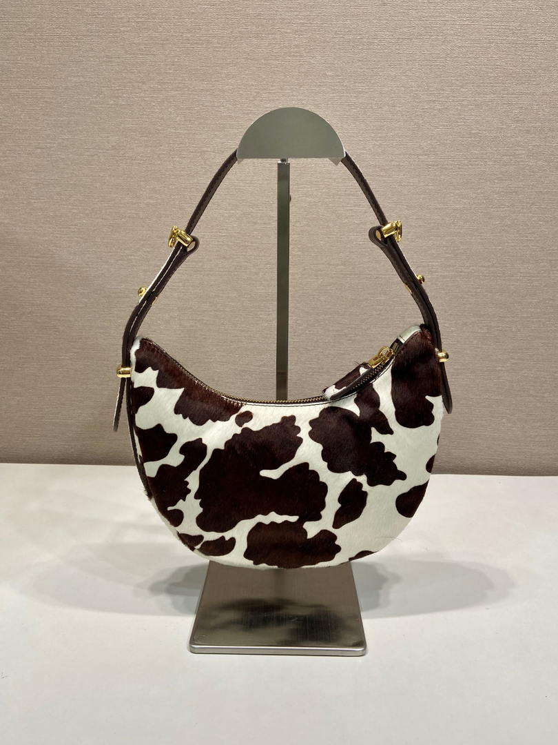 Prada  Arqué printed leather mini shoulder bag 1BC194 Honey White