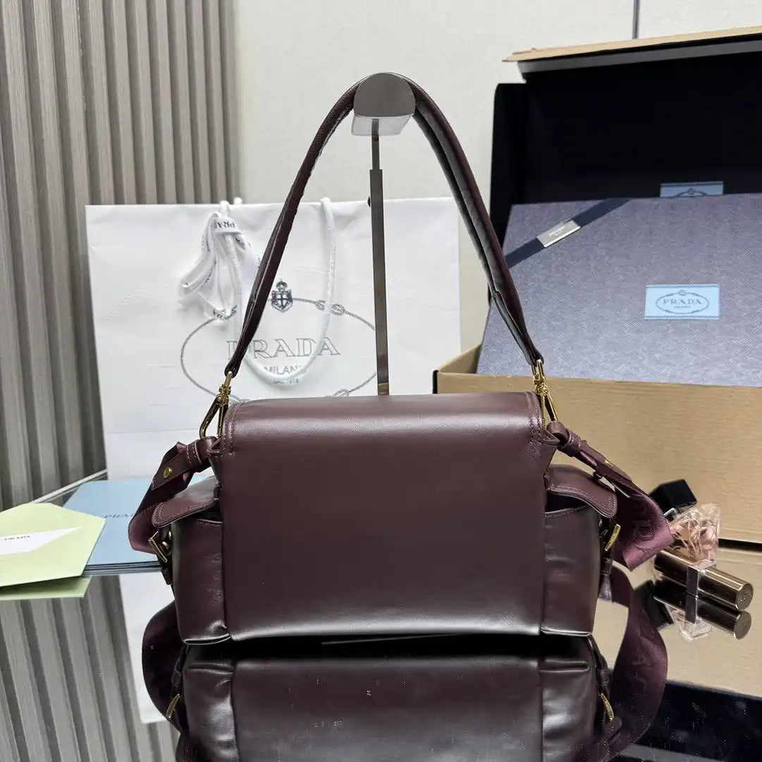 Prada Explore medium nappa leather shoulder bag with flap 1BD394 Dark Red
