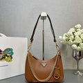 Prada Re-Edition leather mini-bag 1BC204 Brown