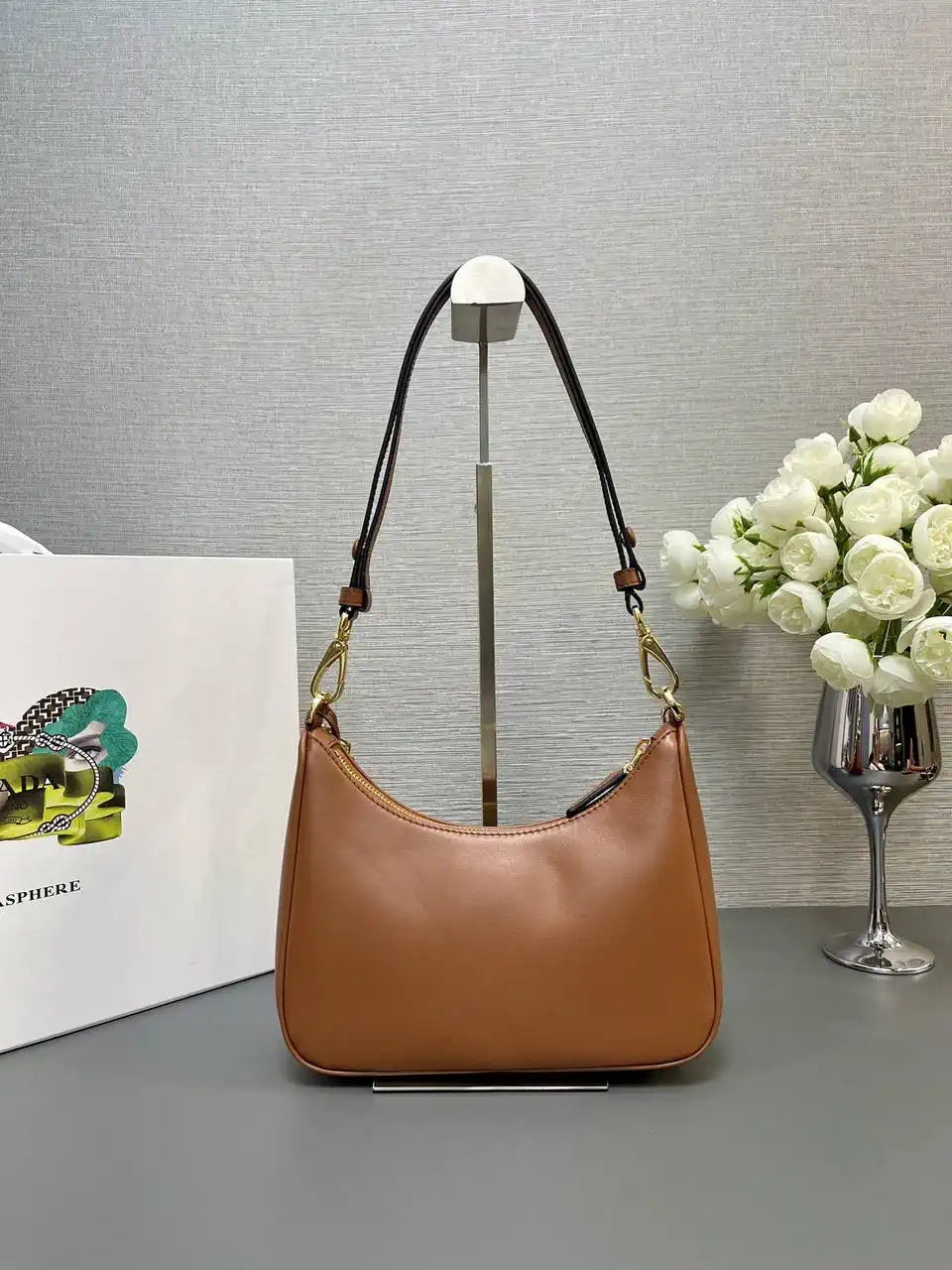 Prada Re-Edition leather mini-bag 1BC204 Brown