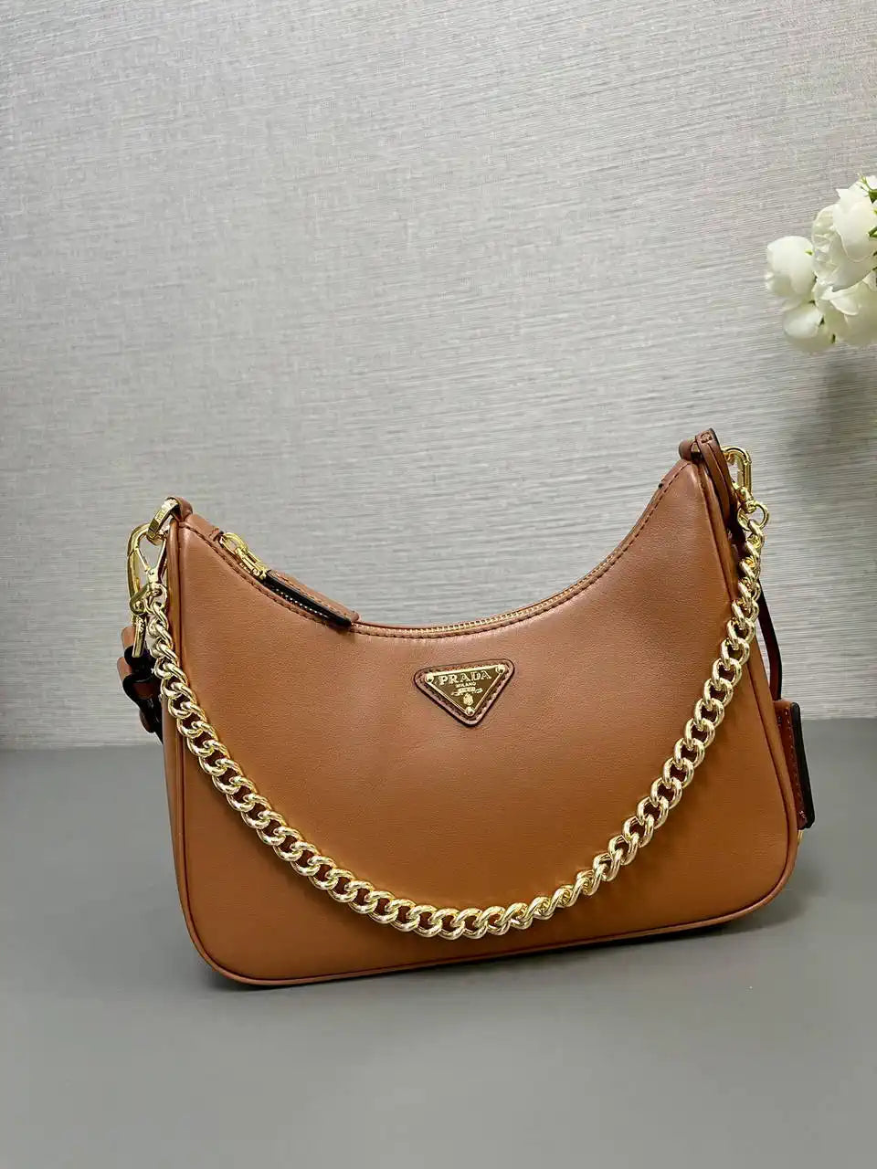 Prada Re-Edition leather mini-bag 1BC204 Brown
