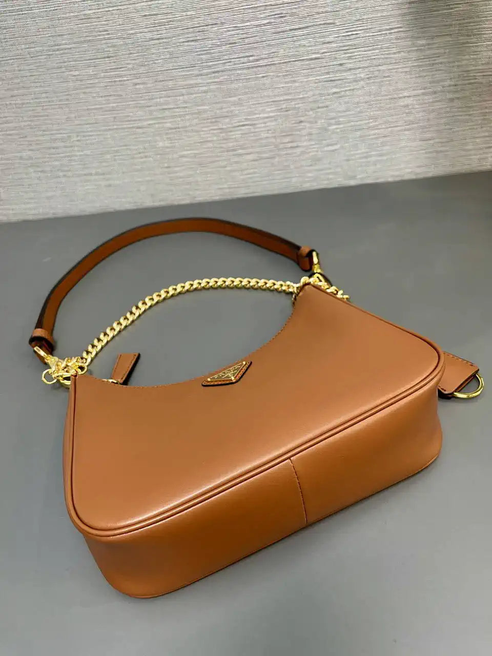 Prada Re-Edition leather mini-bag 1BC204 Brown