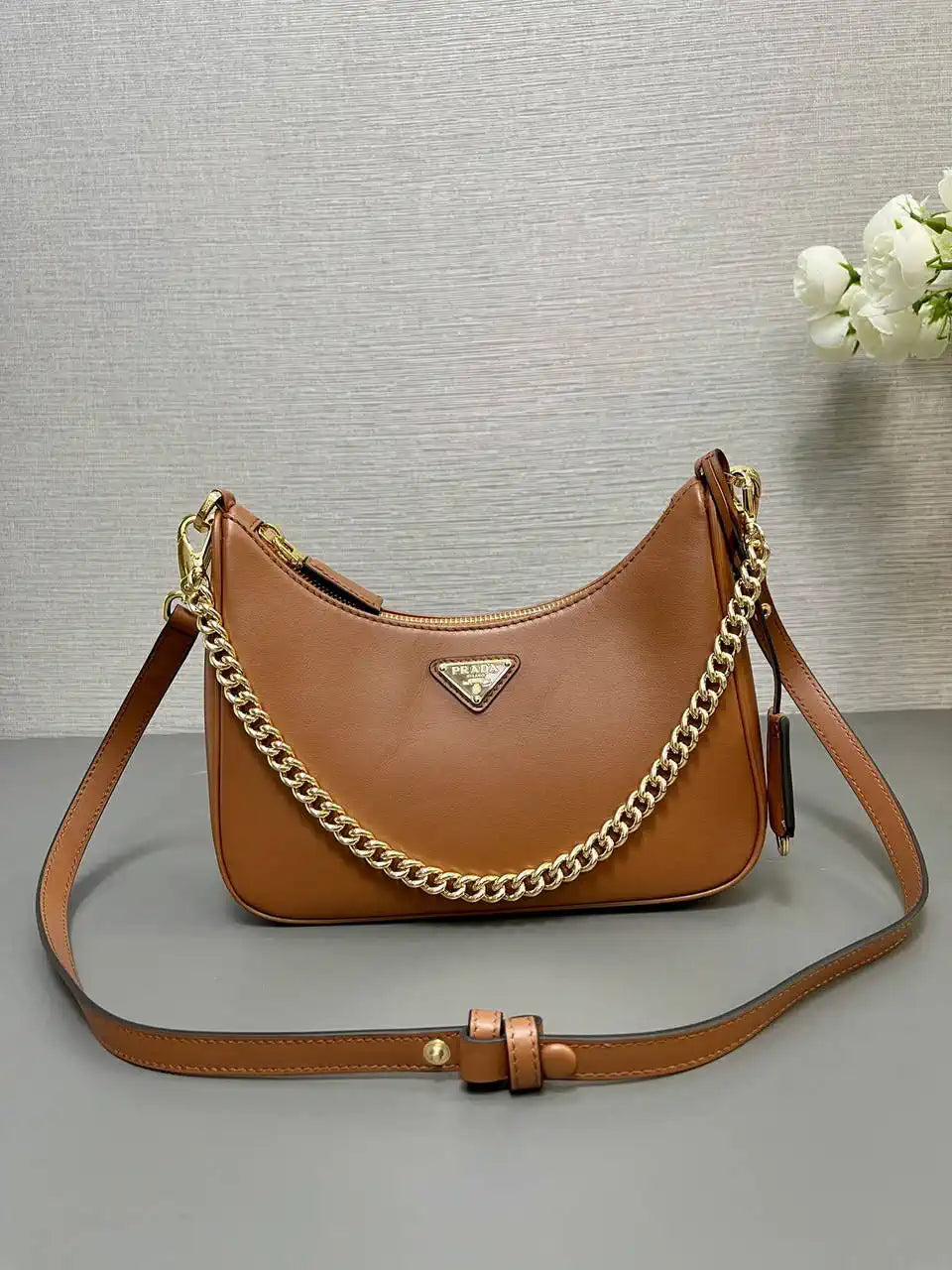 Prada Re-Edition leather mini-bag 1BC204 Brown
