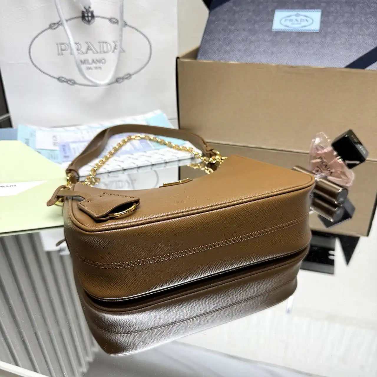 Prada Re-Edition Saffiano leather mini-bag 1BC204 Brown