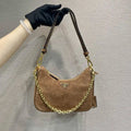 Prada Re-Edition Suede leather mini-bag 1BC204 Brown