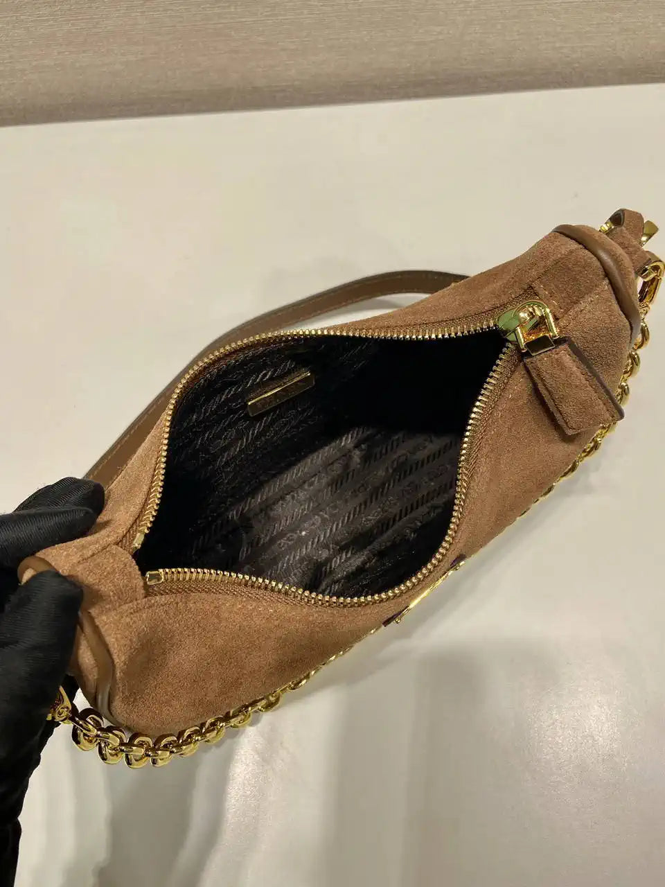 Prada Re-Edition Suede leather mini-bag 1BC204 Brown