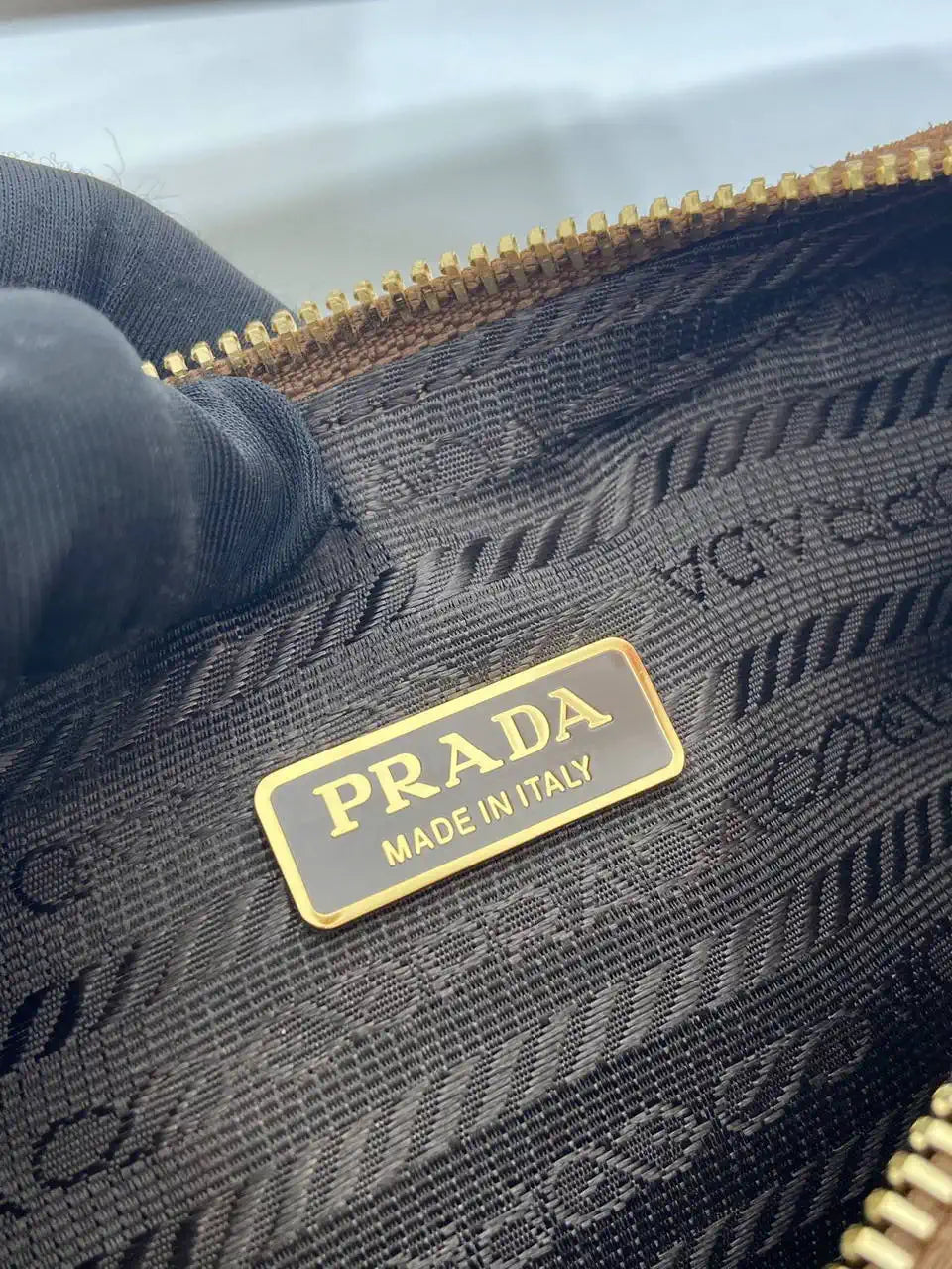 Prada Re-Edition Suede leather mini-bag 1BC204 Brown