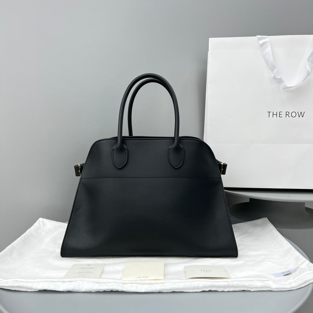 The Row W1255L72 Calfskin Margaux 15 Air buckled textured-leather tote T10990