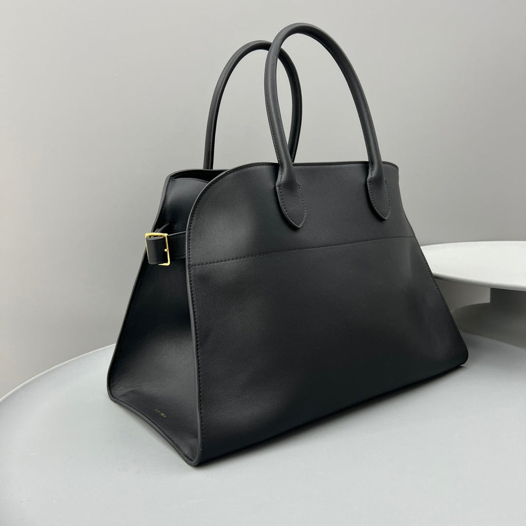 The Row W1255L72 Calfskin Margaux 15 Air buckled textured-leather tote T10990