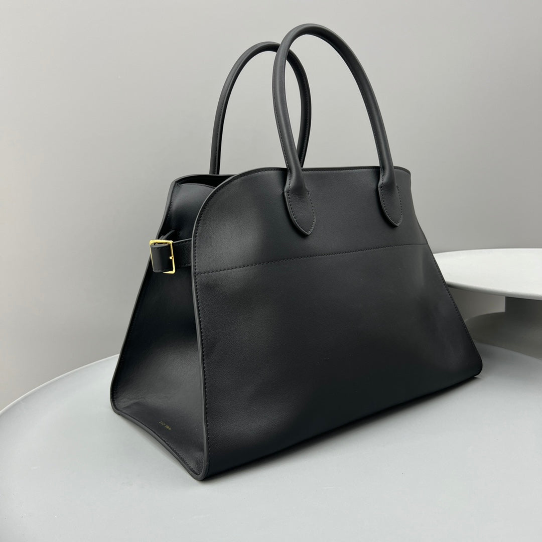 The Row W1255L72 Calfskin Margaux 15 Air buckled textured-leather tote T10990