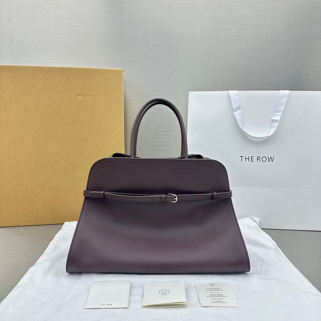 The Row W1255L72 Calfskin Margaux 15 Air buckled textured-leather tote T10992