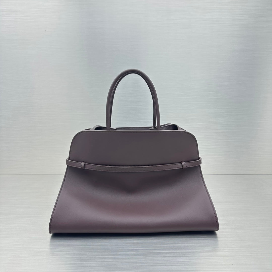 The Row W1255L72 Calfskin Margaux 15 Air buckled textured-leather tote T10992