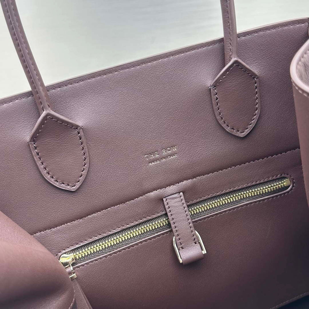 The Row W1255L72 Calfskin Margaux 15 Air buckled textured-leather tote T10992