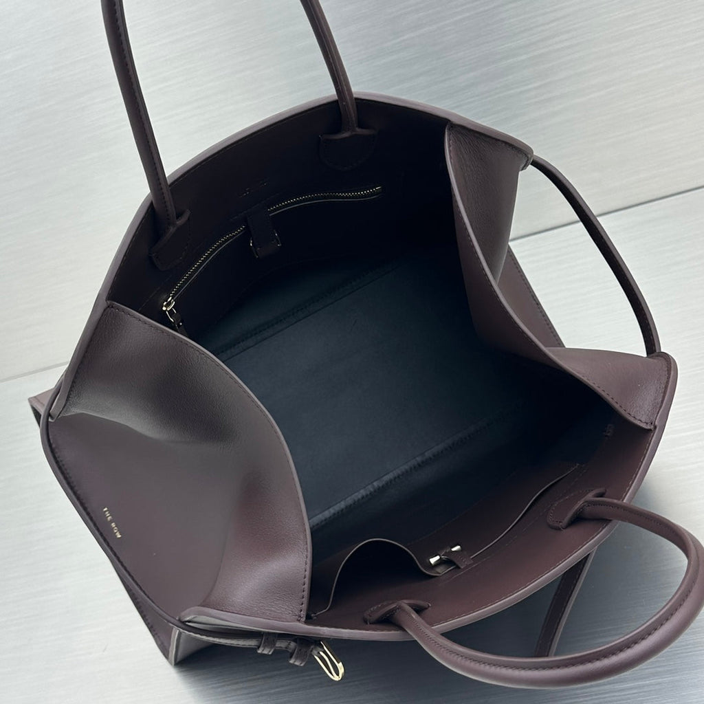 The Row W1255L72 Calfskin Margaux 15 Air buckled textured-leather tote T10992