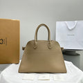 The Row W1255L72 Calfskin Margaux 15 Air buckled textured-leather tote T10994