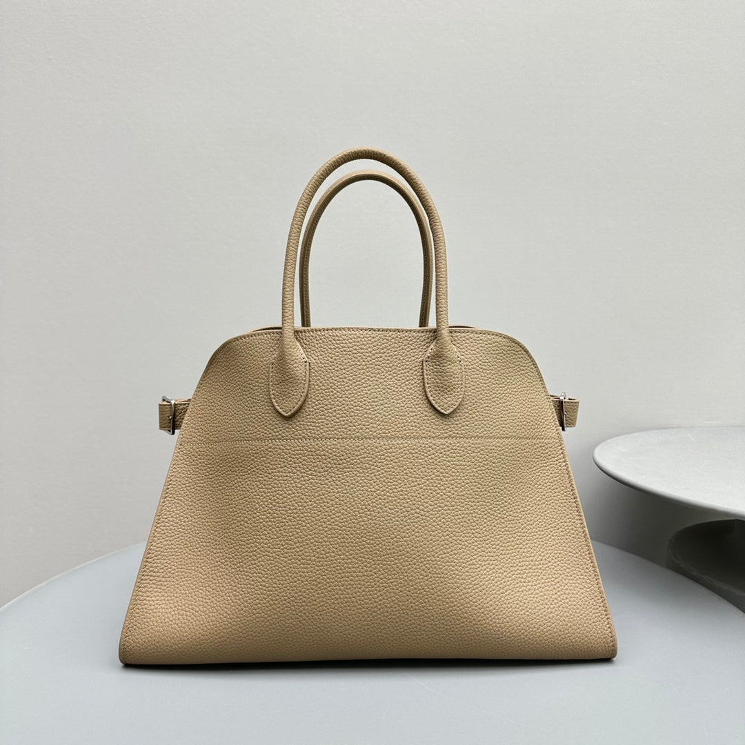 The Row W1255L72 Calfskin Margaux 15 Air buckled textured-leather tote T10994