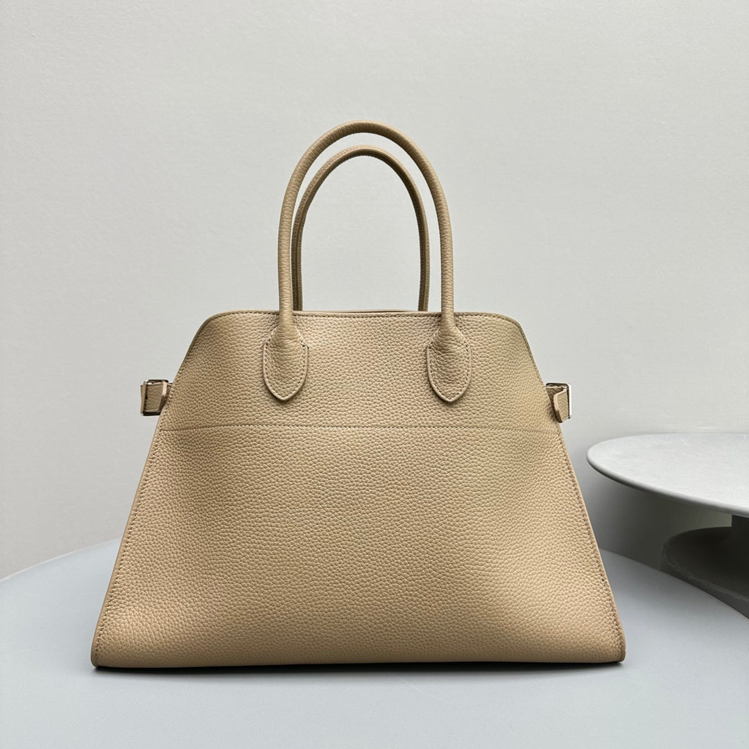 The Row W1255L72 Calfskin Margaux 15 Air buckled textured-leather tote T10994