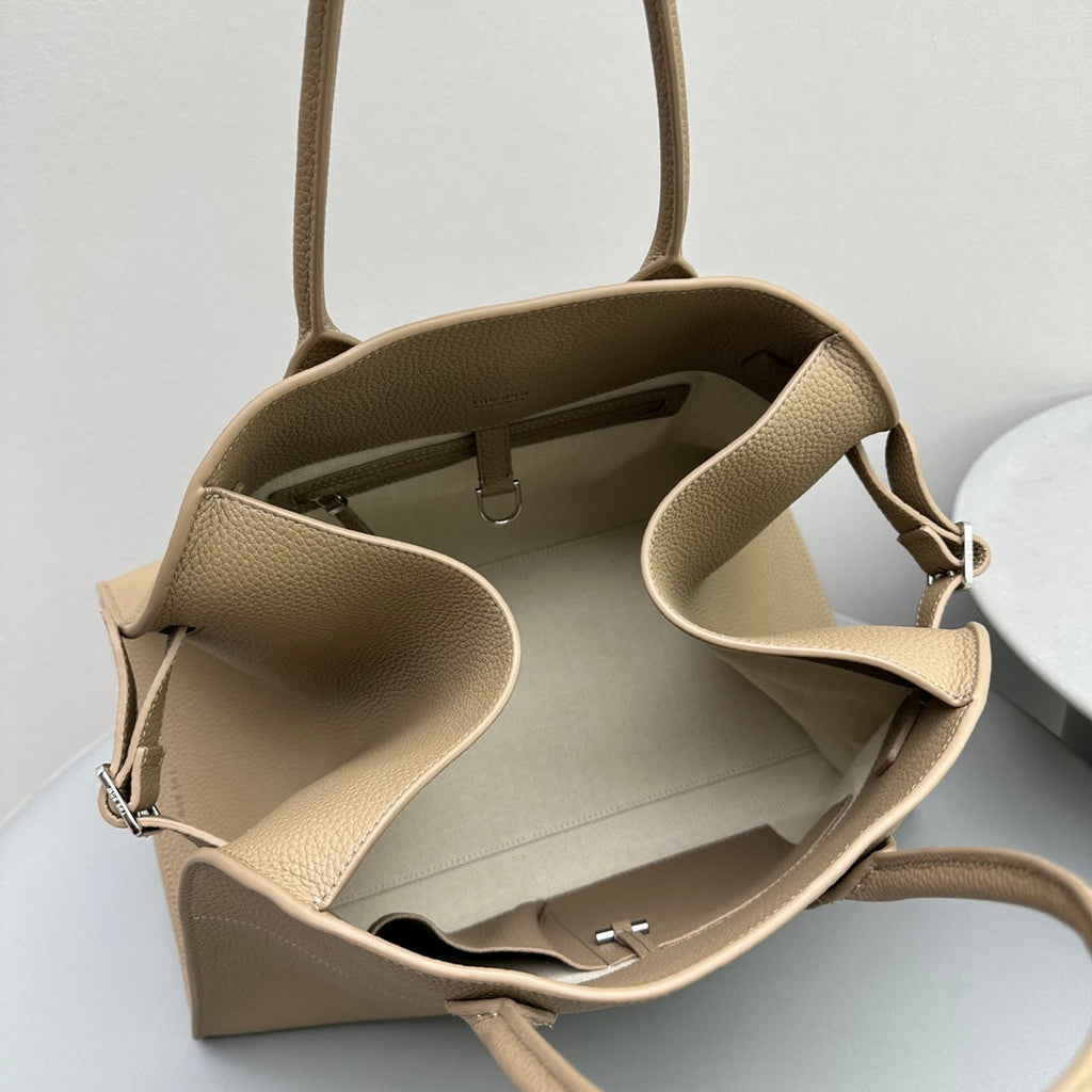 The Row W1255L72 Calfskin Margaux 15 Air buckled textured-leather tote T10994