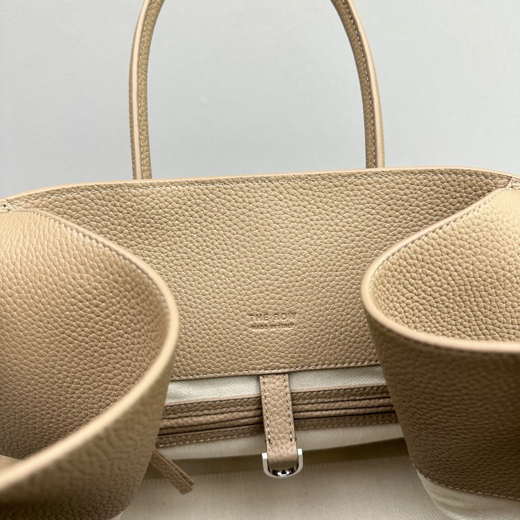 The Row W1255L72 Calfskin Margaux 15 Air buckled textured-leather tote T10994