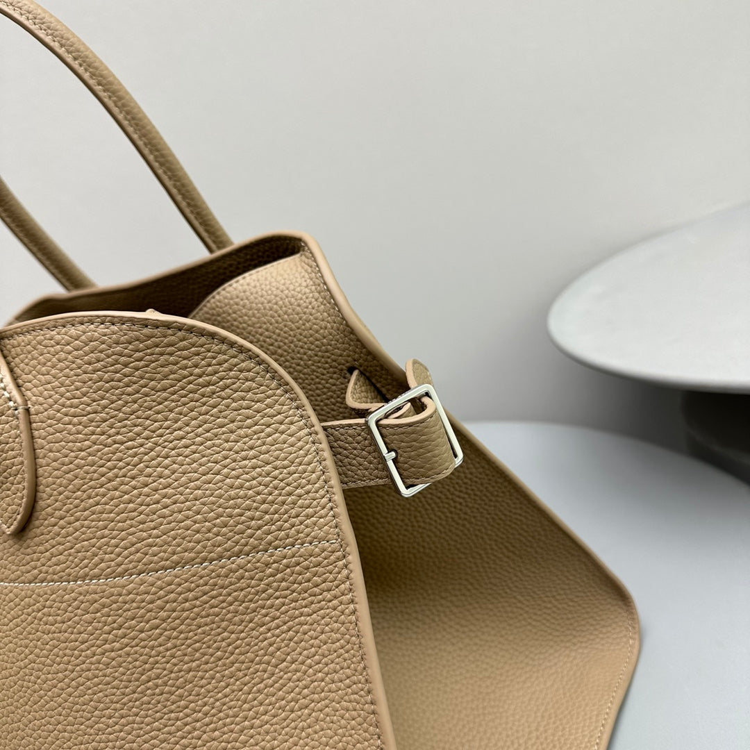 The Row W1255L72 Calfskin Margaux 15 Air buckled textured-leather tote T10994