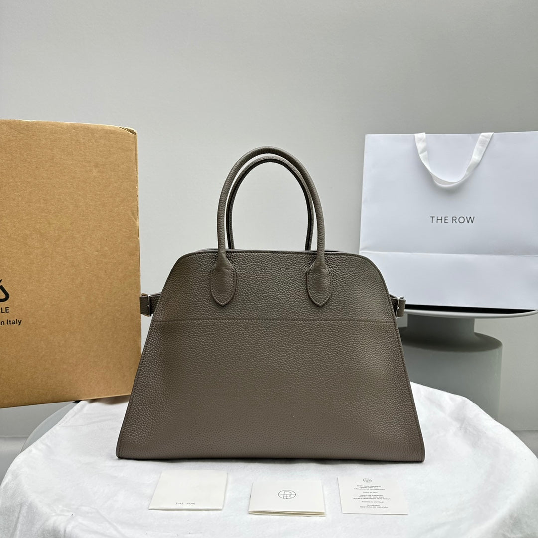 The Row W1255L72 Calfskin Margaux 15 Air buckled textured-leather tote T10995