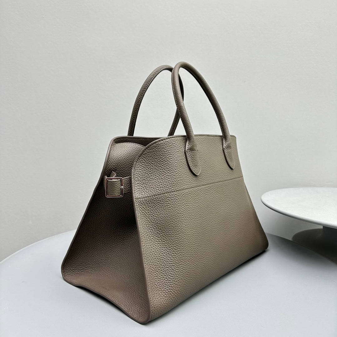 The Row W1255L72 Calfskin Margaux 15 Air buckled textured-leather tote T10995