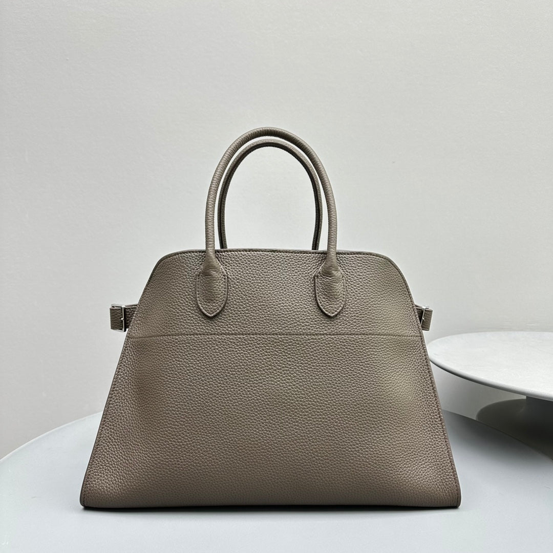 The Row W1255L72 Calfskin Margaux 15 Air buckled textured-leather tote T10995