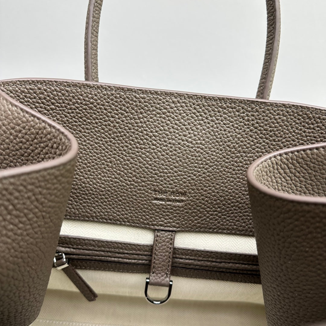The Row W1255L72 Calfskin Margaux 15 Air buckled textured-leather tote T10995