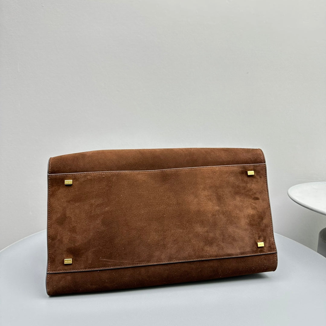 The Row W1255L72 Suede Soft Margaux 15 Air buckled tote T11000