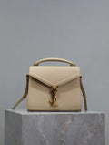 YSL 623930 Cassandra Mini Top Handle Bag In Grain De Poudre Embossed Leather Apricot