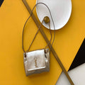 YSL 672738 Monogram Mini Nolita In Lam¨¦ Leather Gold