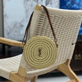 YSL 744292 Saint Laurent Round Bag In Raffia And Vegetable-Tanned Leather - Default Title - View 1