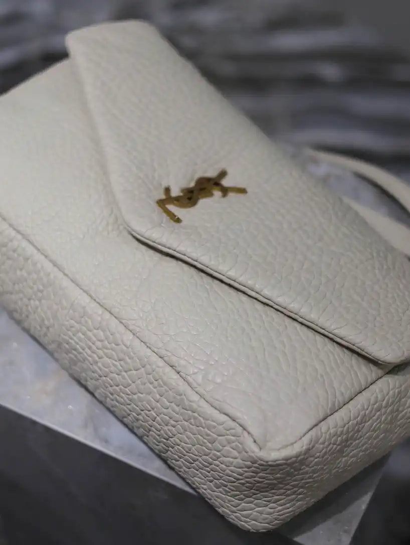 YSL 777399 Calypso large in grained lambskin White