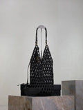 YSL 821911 supple bucket in wood beads Black